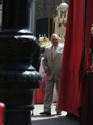 Well dressed old man in religious background